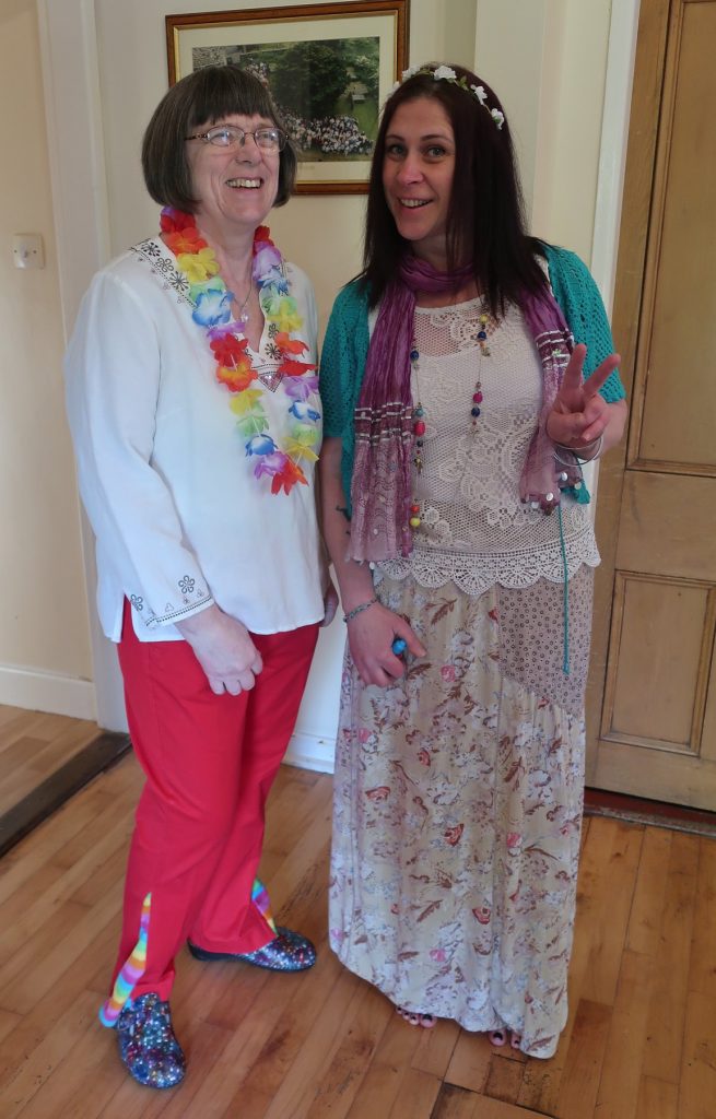 Margaret and Ellie with amazing extended flowery flares and full hippy chic