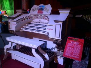 A large, white Wurlitzer organ